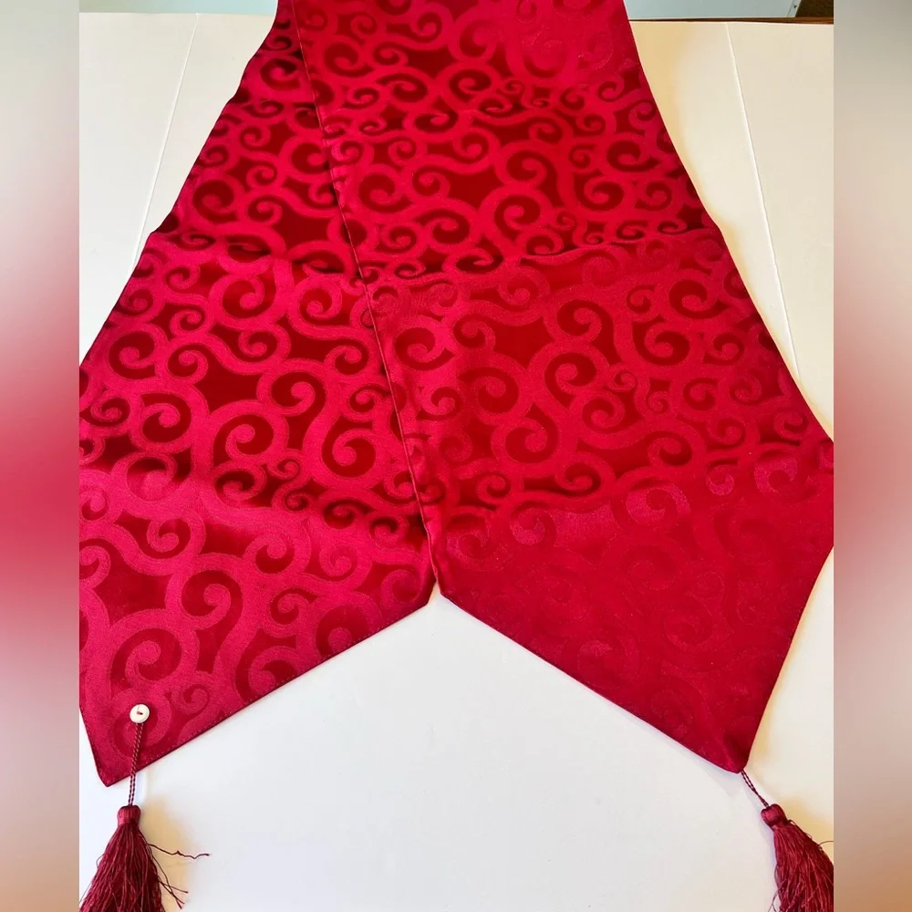 Rich Red Damask Designed Table Runner with Tassels. Approximately 72 x 14 Inches